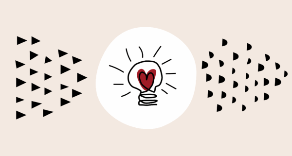 Sisällöntuottajan työkalut -artikkelin kuvituskuva, jossa idealamppu, jonka sisällä punainen sydän.